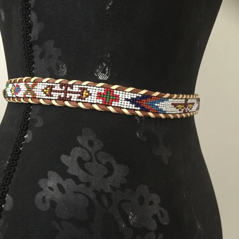 Vintage beaded belt size 26. Firebird design.
